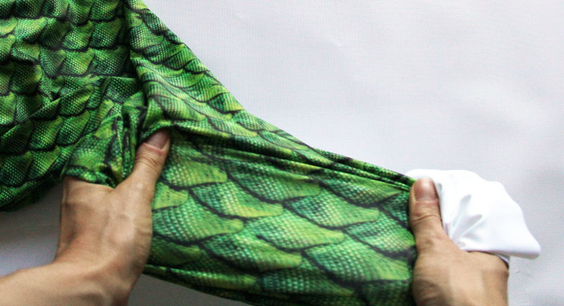 stretching print in swimsuit fabric