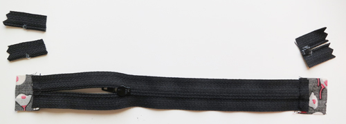 trim edges of zipper